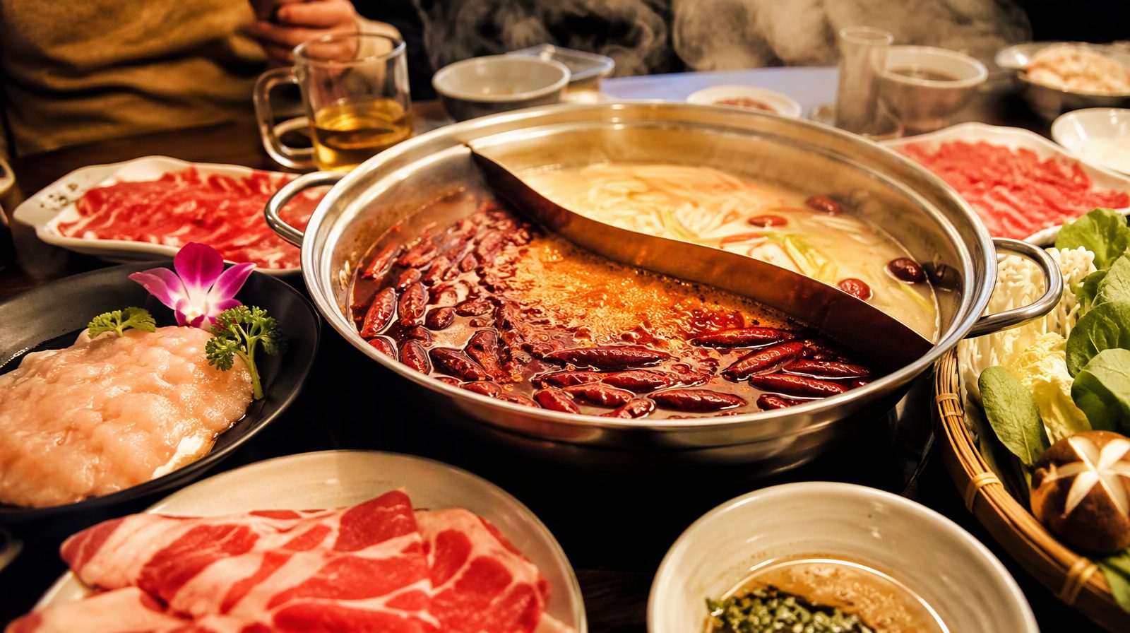 A bubbling Sichuan hotpot with red chilli broth